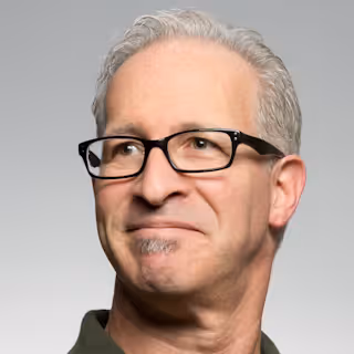 Senior engineer reviewing audit results